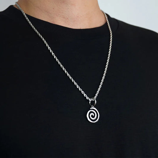 Collar con dije de espiral geométrico en acero de titanio
