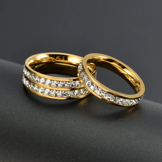 Anillos de acero 304 con baño de oro 18K para pareja, diseño circular