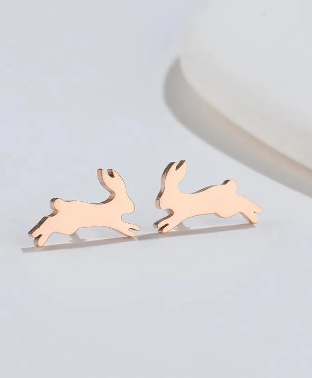 Aretes de botón de acero 304 con baño de oro 18K y diseño de animalitos - imagen 31