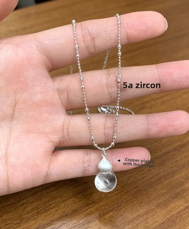 Collar con dije de cristal transparente y acabado cepillado para mujer - imagen 3