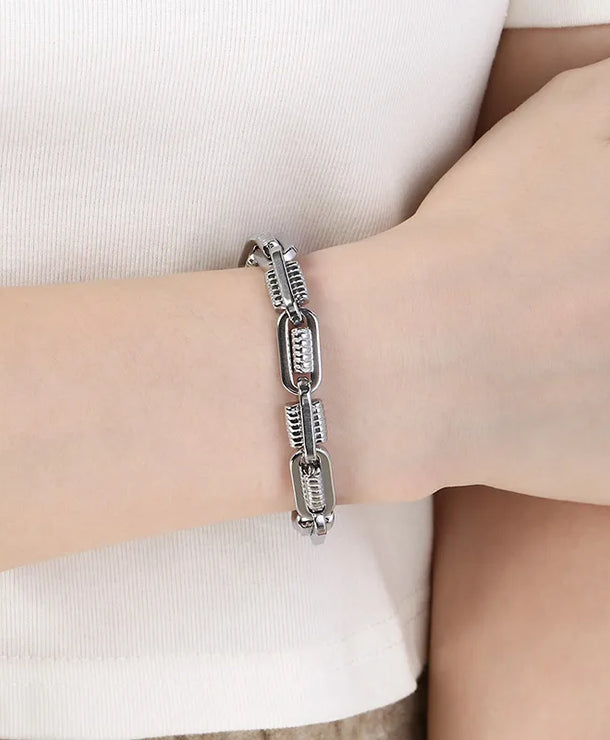 Pulsera de eslabones ovalados con patrón de engranaje chapada en oro 18K - imagen 9