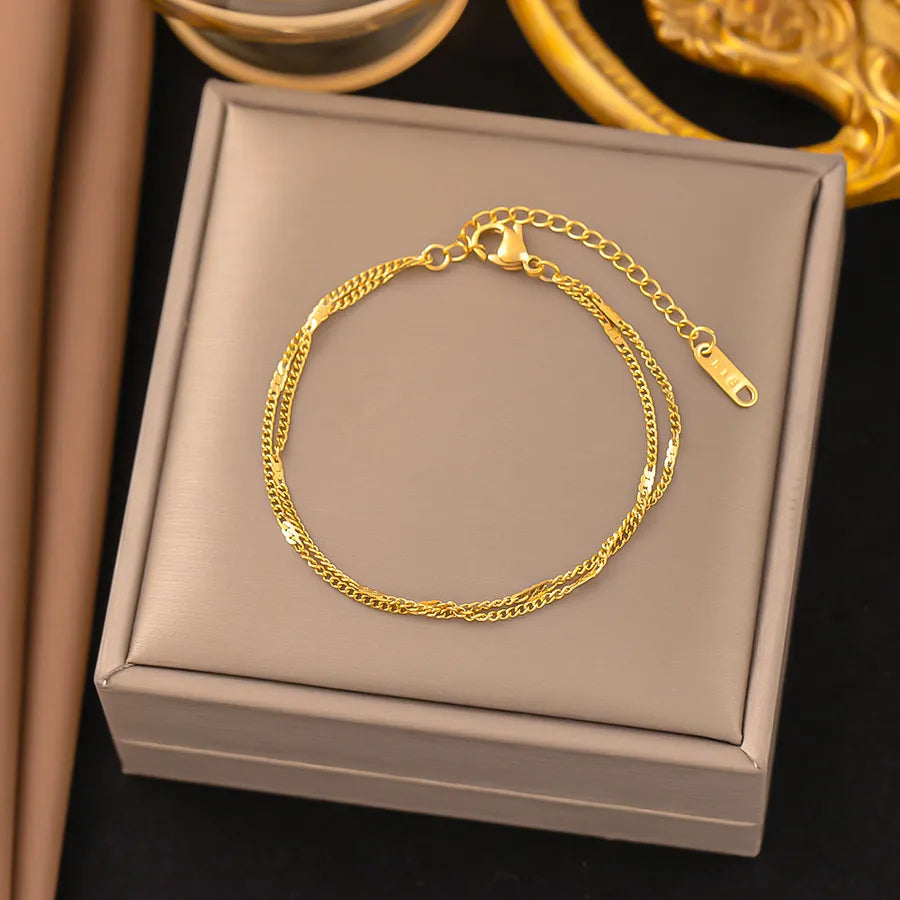 Pulsera de corazones con cadena cubana en acero 304 y baño de oro 18K - imagen 20
