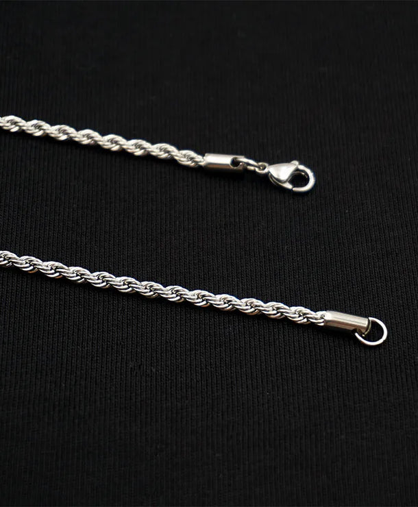 Collar con dije de espiral geométrico en acero de titanio - imagen 4