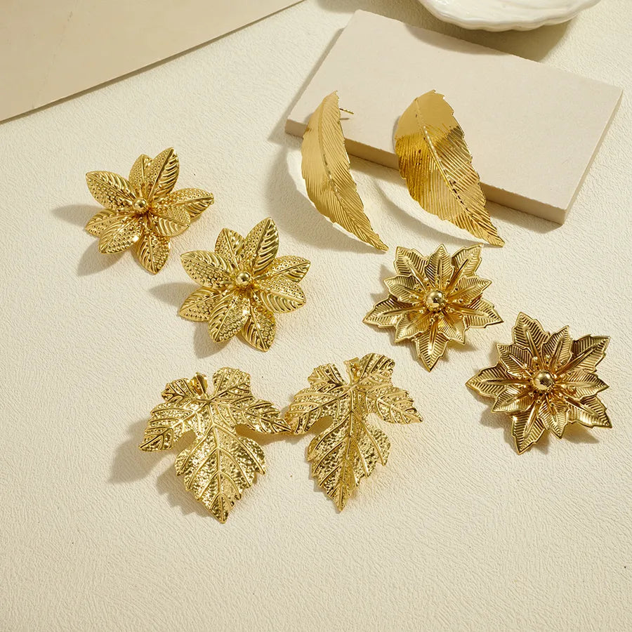 Aretes de botón de acero 304 con diseño de hoja tropical para mujer