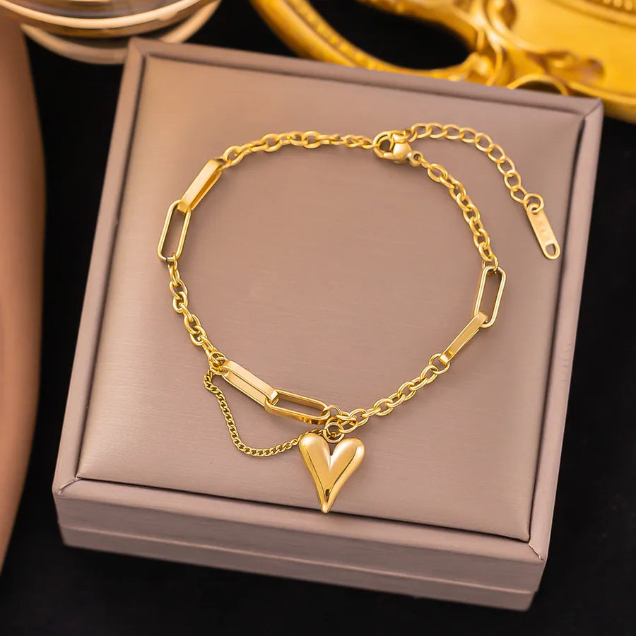 Pulsera de corazones con cadena cubana en acero 304 y baño de oro 18K - imagen 9