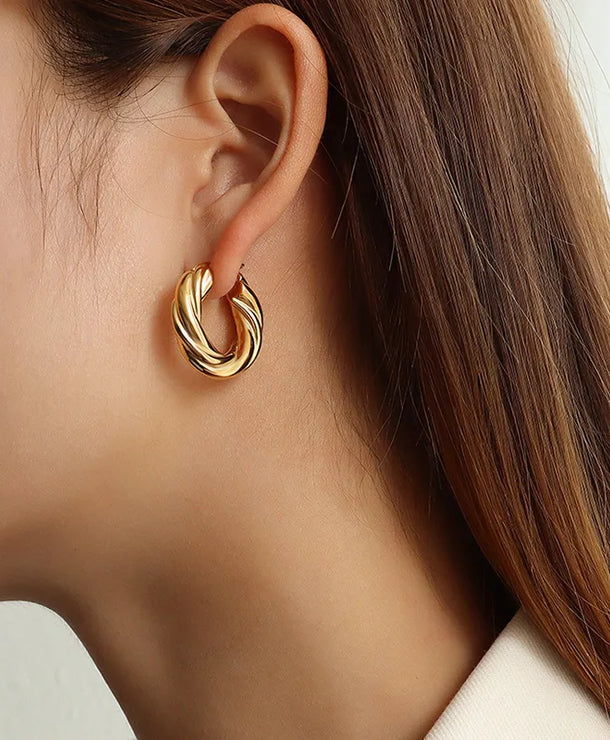 Aretes de acero inoxidable 304 con baño de oro 18K y diseño geométrico - imagen 3