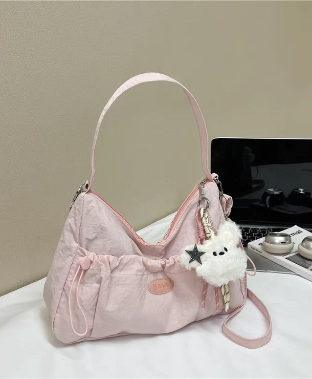Bolso cruzado forma dumpling para mujer en nylon con pliegues - imagen 7