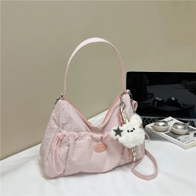 Bolso cruzado forma dumpling para mujer en nylon con pliegues - imagen 7