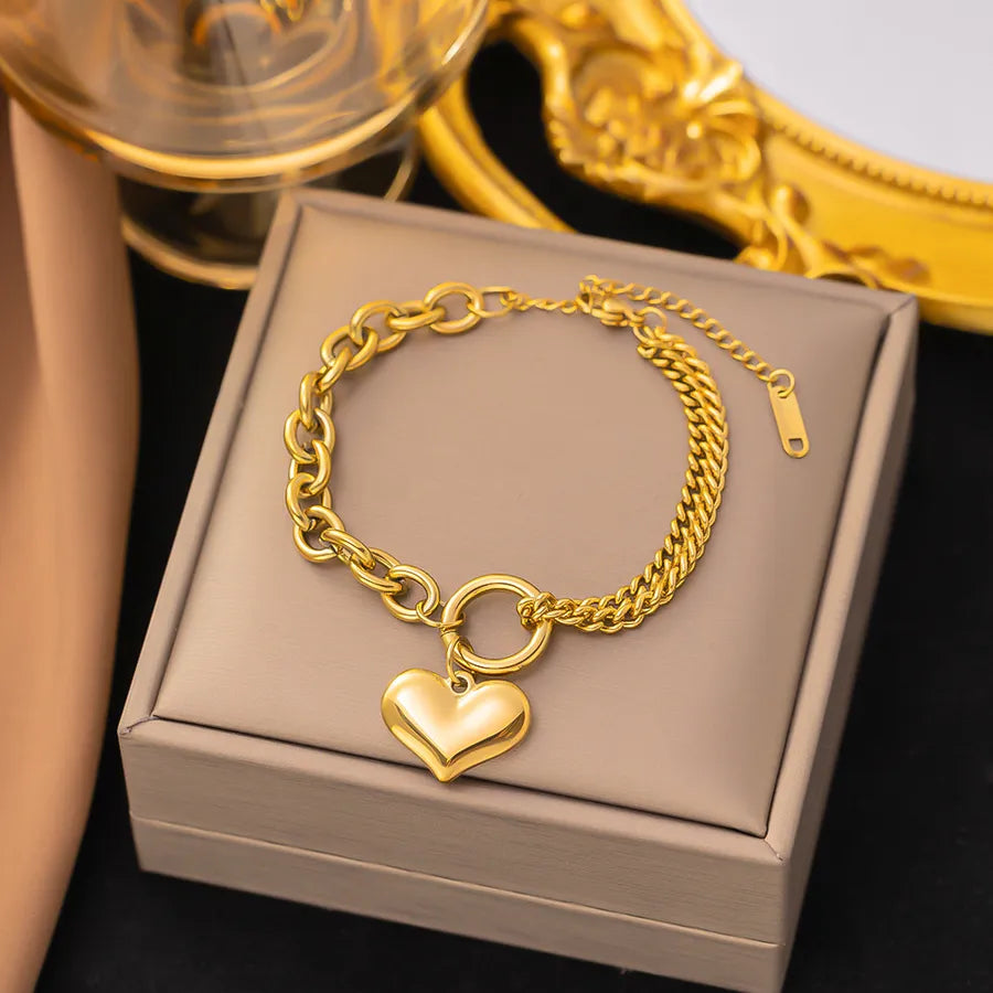 Pulsera de corazones con cadena cubana en acero 304 y baño de oro 18K - imagen 42