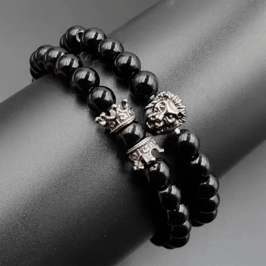 Set de 2 brazaletes de aleación negra con diseño de corona para hombre