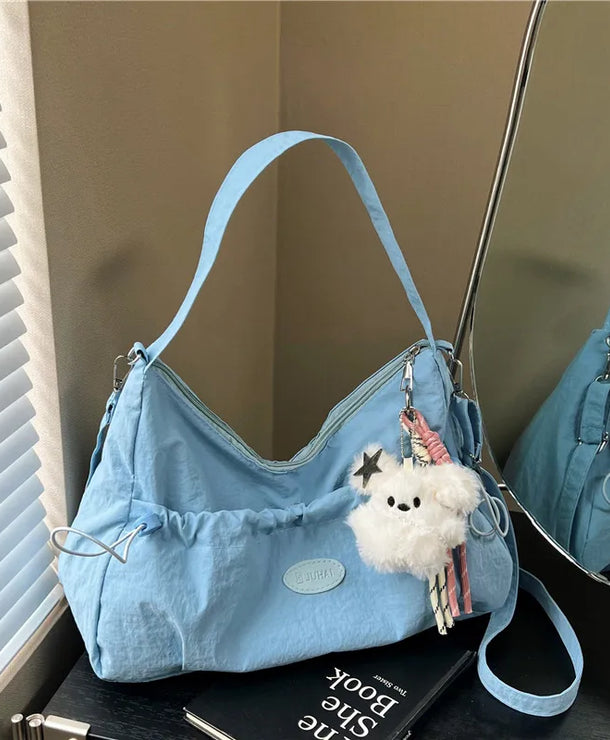 Bolso cruzado forma dumpling para mujer en nylon con pliegues