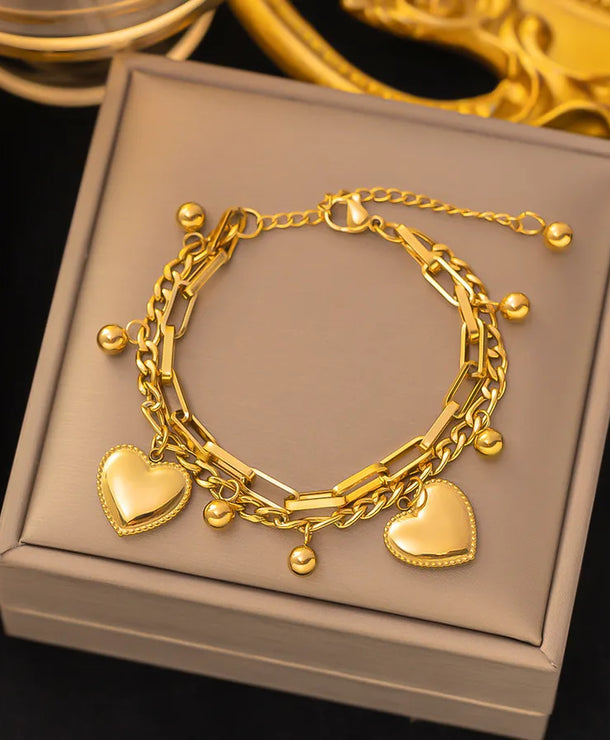 Pulsera de corazones con cadena cubana en acero 304 y baño de oro 18K - imagen 36