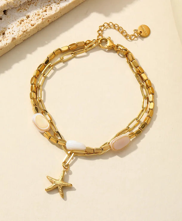 Pulsera de acero 304 con dijes de estrella de mar, corazón y concha - imagen 11