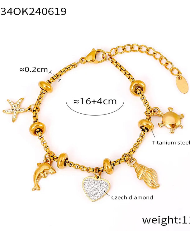 Pulsera de acero 304 con baño de oro 18K y dijes de cruz, estrella y corazón - imagen 13