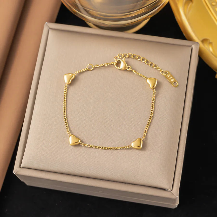 Pulsera de corazones con cadena cubana en acero 304 y baño de oro 18K - imagen 12