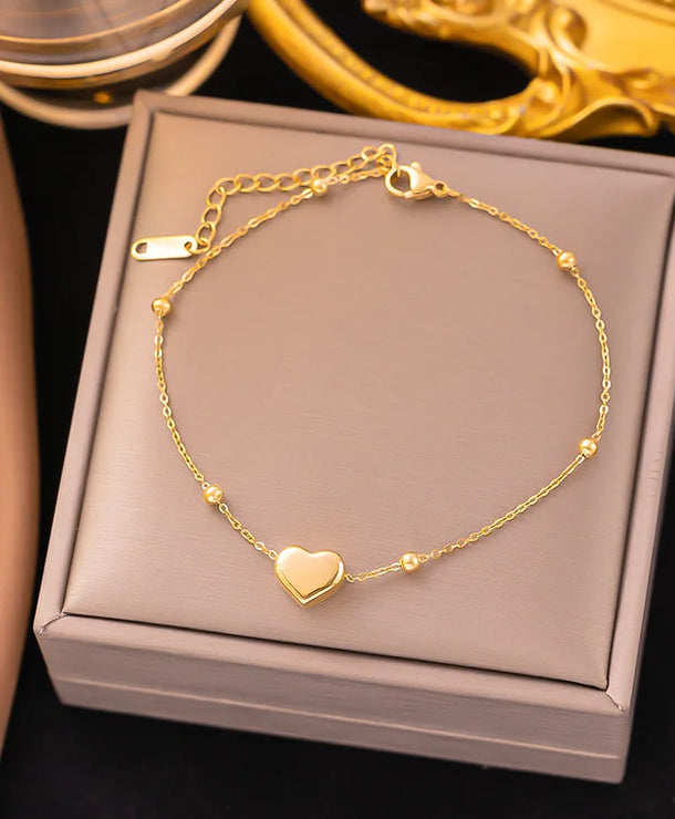 Pulsera de corazones con cadena cubana en acero 304 y baño de oro 18K - imagen 17