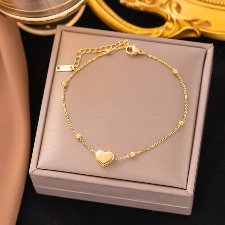 Pulsera de corazones con cadena cubana en acero 304 y baño de oro 18K - imagen 17