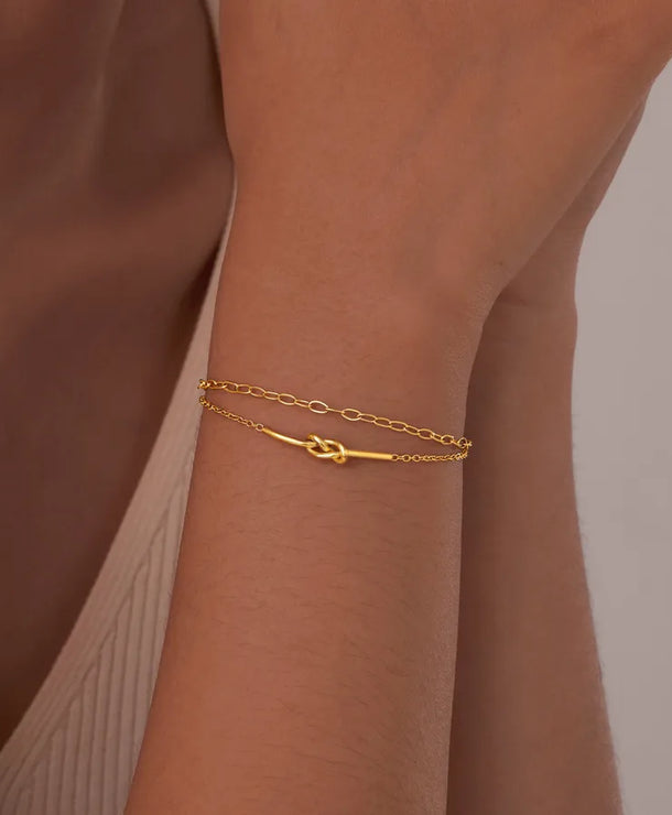 Pulsera con diseño de nudo en acero 201 y baño de oro 18K - imagen 7