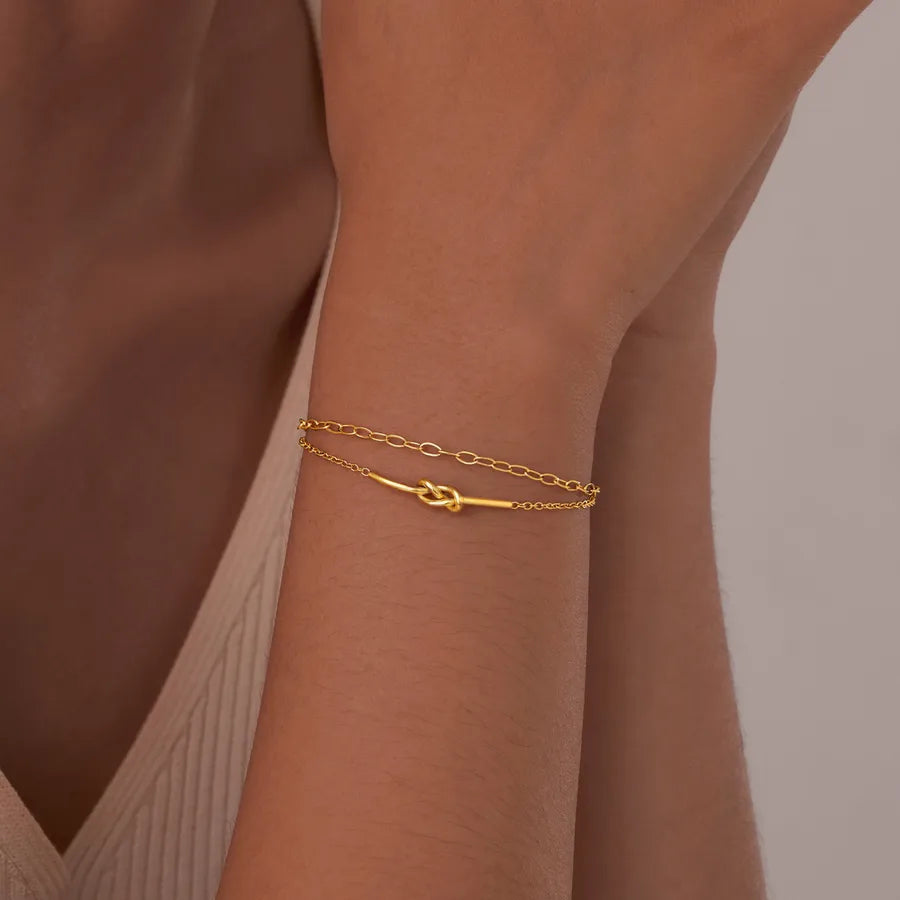Pulsera con diseño de nudo en acero 201 y baño de oro 18K - imagen 7