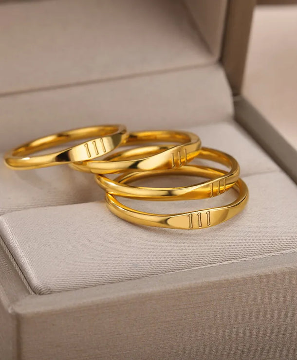 Anillo de números de acero inoxidable con detalle dorado, unisex