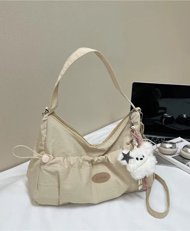 Bolso cruzado forma dumpling para mujer en nylon con pliegues - imagen 10