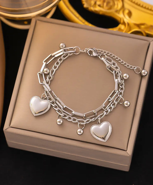 Pulsera de corazones con cadena cubana en acero 304 y baño de oro 18K - imagen 27