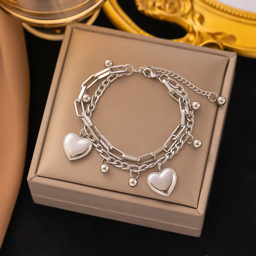 Pulsera de corazones con cadena cubana en acero 304 y baño de oro 18K - imagen 27