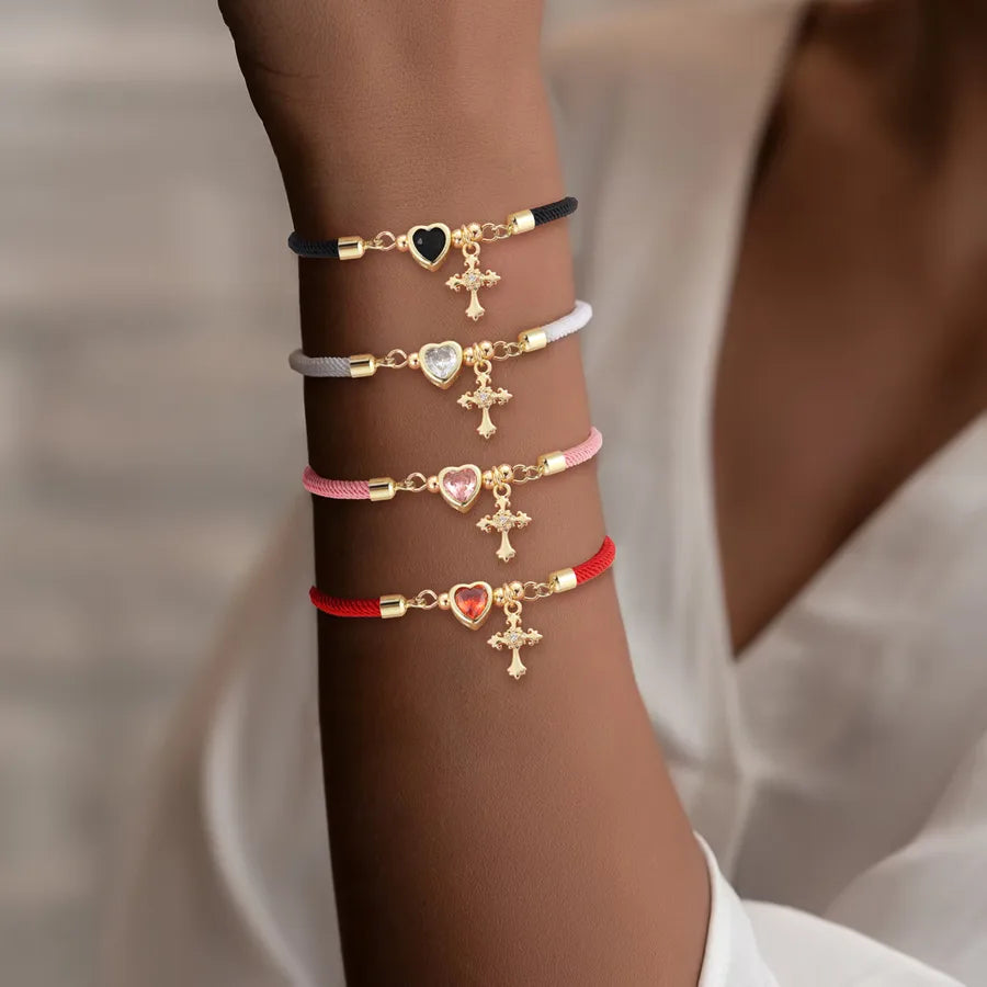 Pulsera de cordón con dijes de cruz y corazón en circonia para mujer