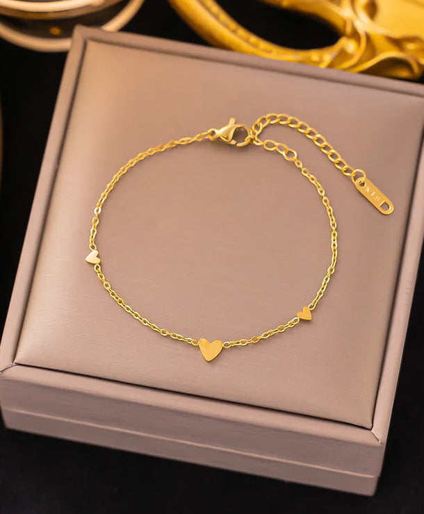 Pulsera de corazones con cadena cubana en acero 304 y baño de oro 18K - imagen 28