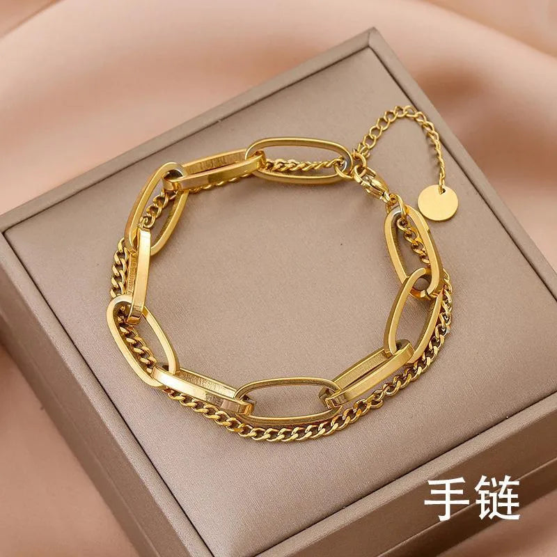Pulsera de corazones con cadena cubana en acero 304 y baño de oro 18K - imagen 30