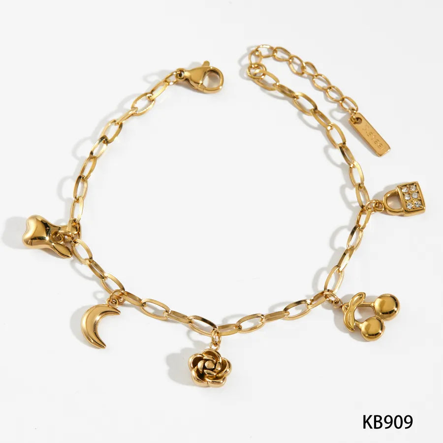 Pulsera de flores de cereza con baño de oro y circonias en acero 304 - imagen 8
