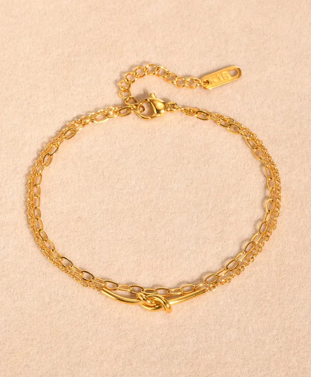 Pulsera con diseño de nudo en acero 201 y baño de oro 18K - imagen 8