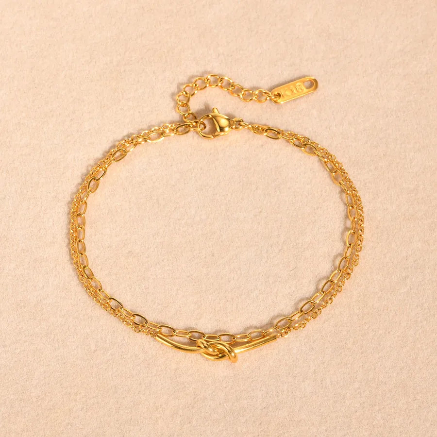 Pulsera con diseño de nudo en acero 201 y baño de oro 18K - imagen 8