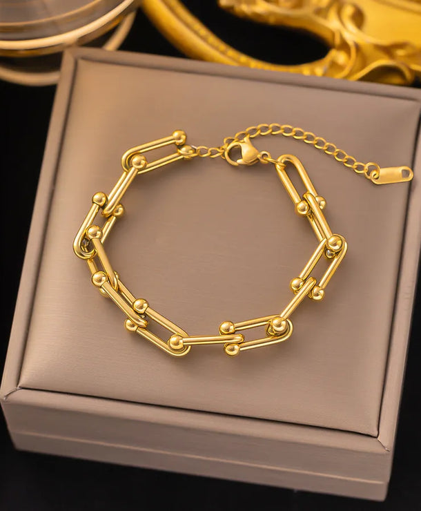 Pulsera de corazones con cadena cubana en acero 304 y baño de oro 18K - imagen 37