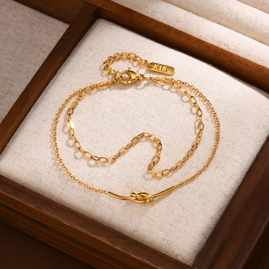 Pulsera con diseño de nudo en acero 201 y baño de oro 18K - imagen 3