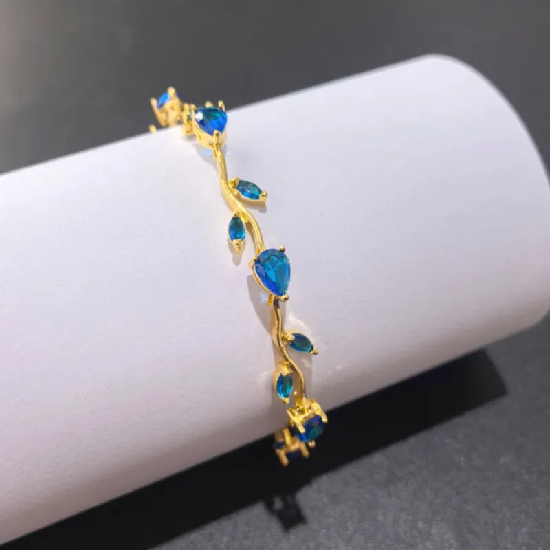 Pulsera de acero 304 con baño de oro 18K y diseño de hojas para mujer - imagen 2