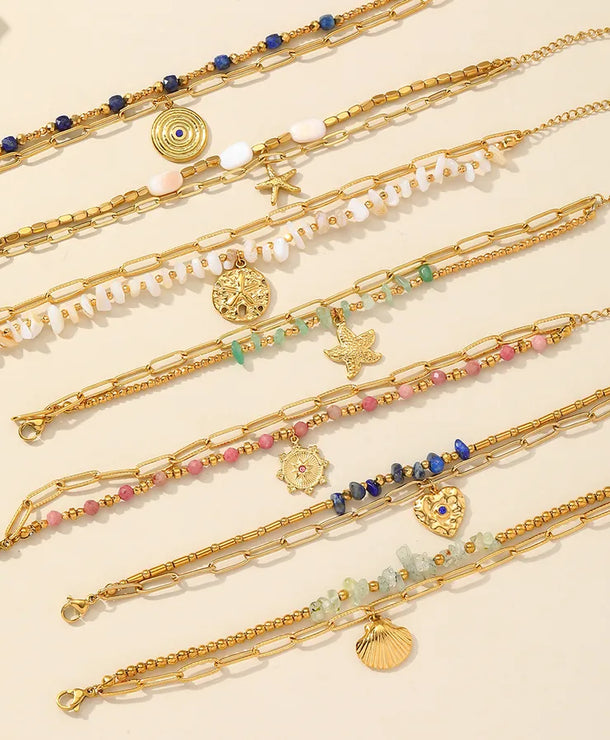Pulsera de acero 304 con dijes de estrella de mar, corazón y concha - imagen 2