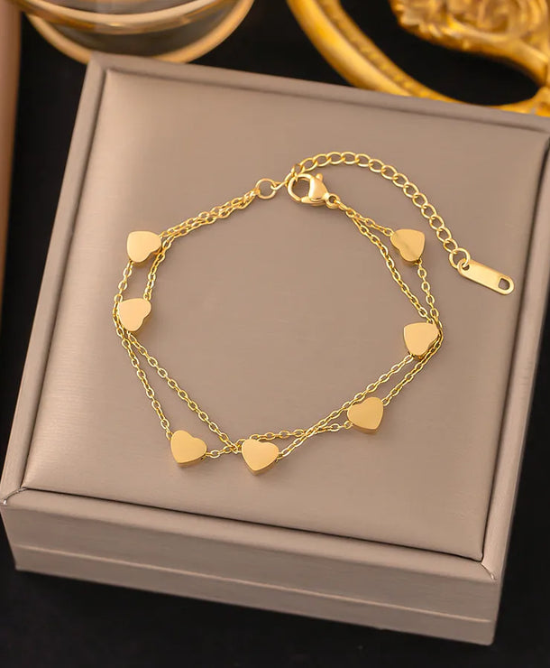 Pulsera de corazones con cadena cubana en acero 304 y baño de oro 18K - imagen 25