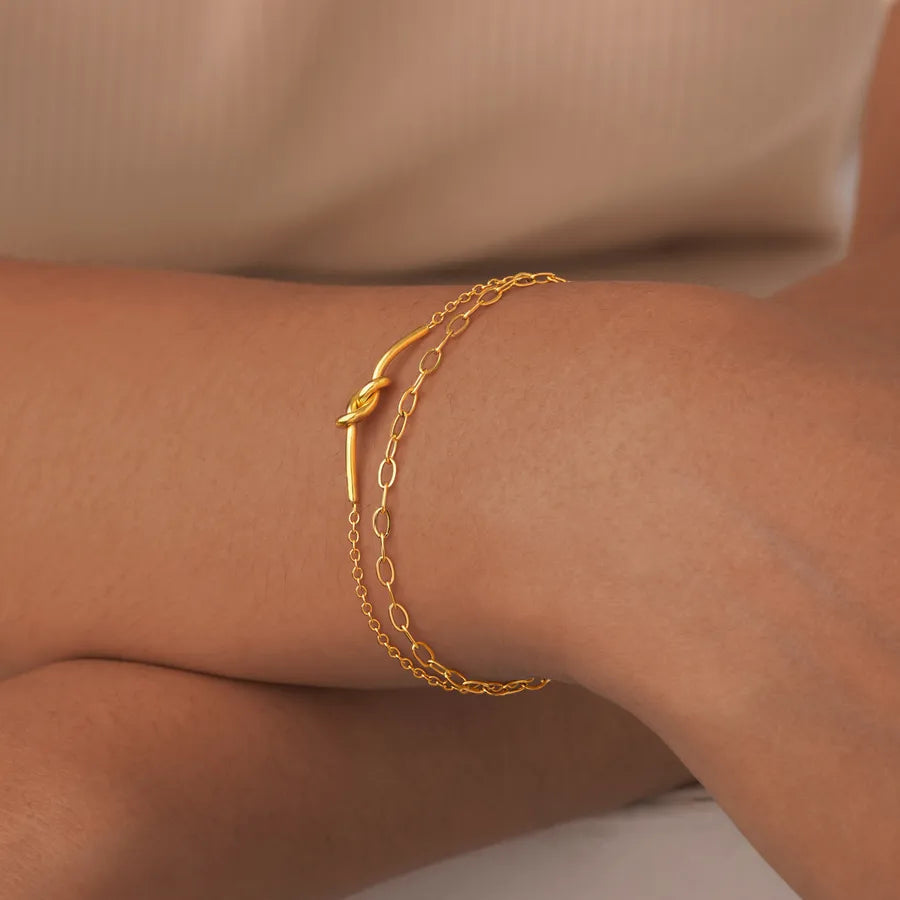 Pulsera con diseño de nudo en acero 201 y baño de oro 18K - imagen 4