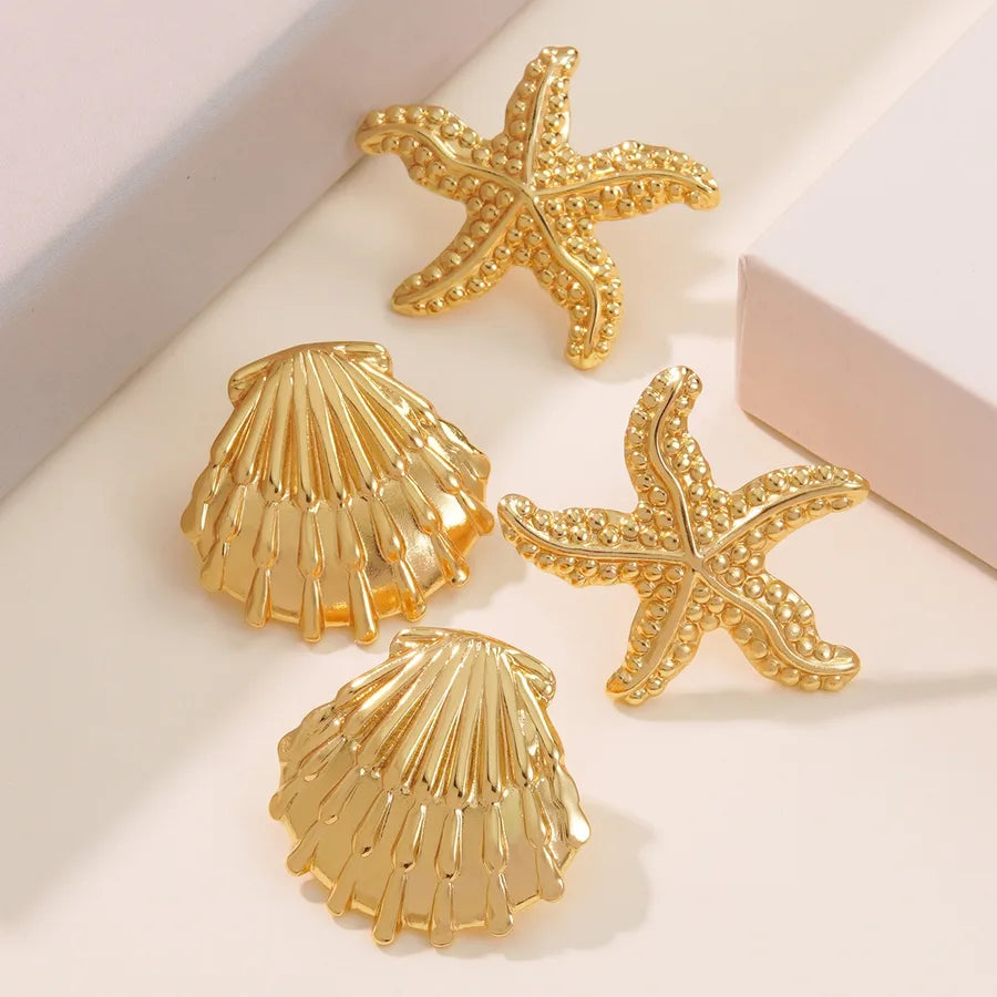 Aretes de botón de acero 304 con diseño de estrella de mar y concha