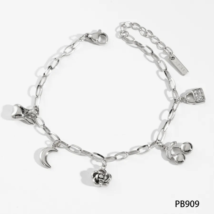 Pulsera de flores de cereza con baño de oro y circonias en acero 304 - imagen 7