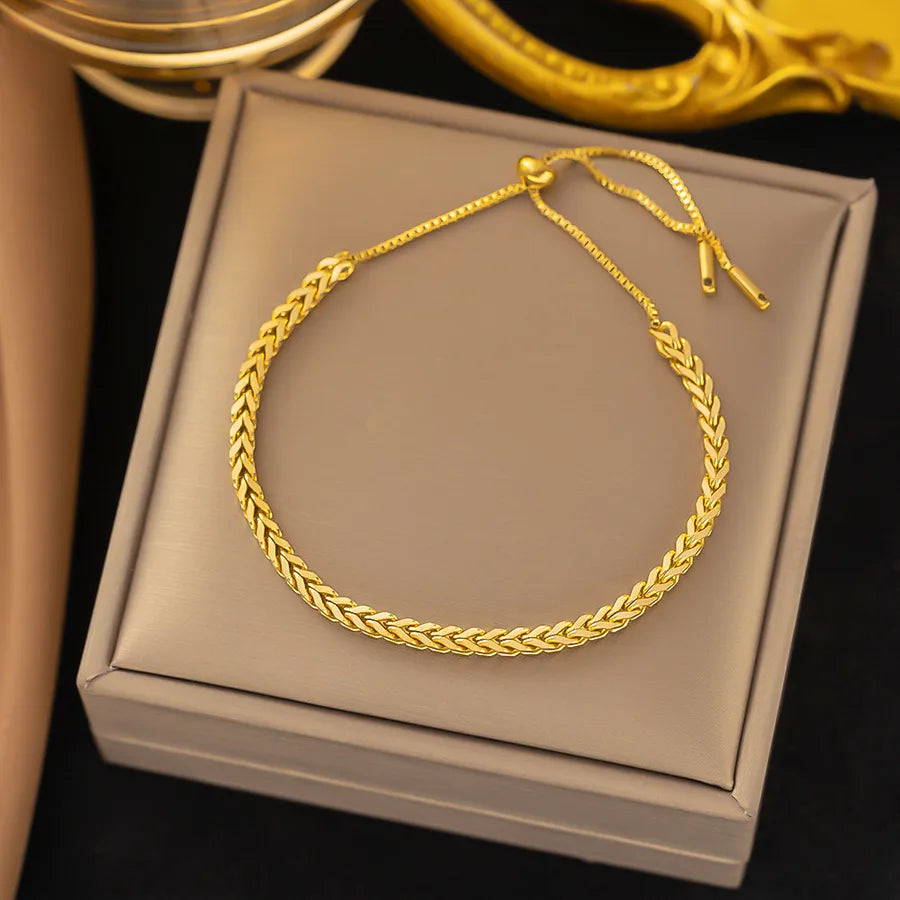 Pulsera de corazones con cadena cubana en acero 304 y baño de oro 18K - imagen 18