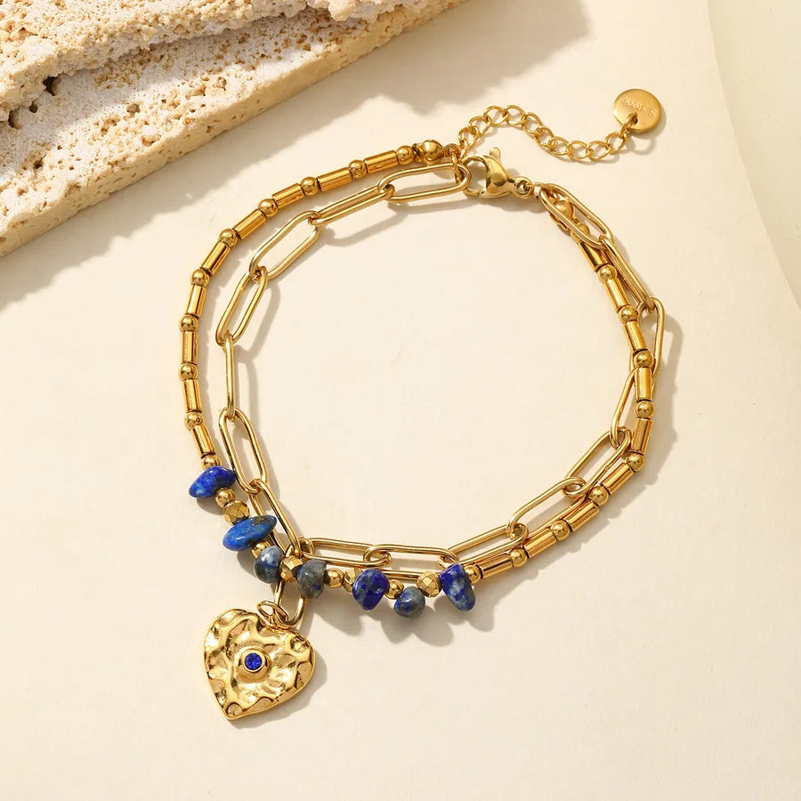 Pulsera de acero 304 con dijes de estrella de mar, corazón y concha - imagen 6