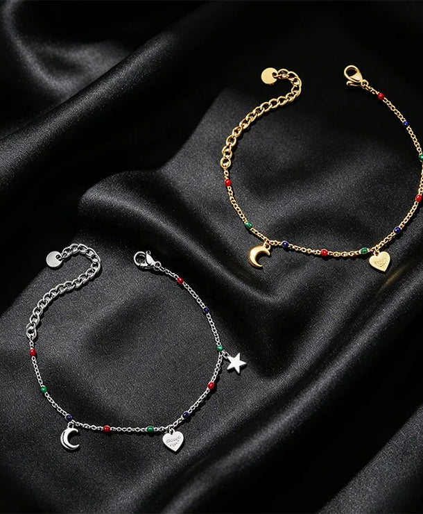 Pulsera XUPING de acero 304 con diseño de luna en esmalte para mujer