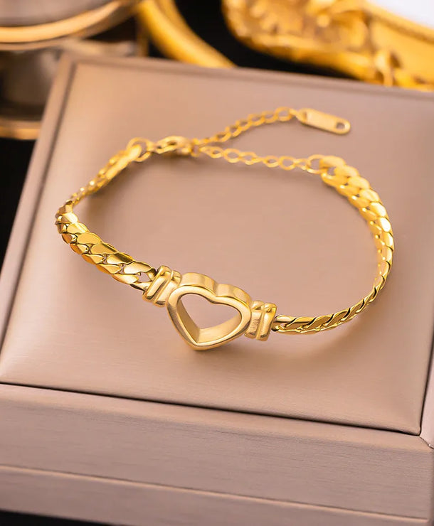 Pulsera de corazones con cadena cubana en acero 304 y baño de oro 18K - imagen 29