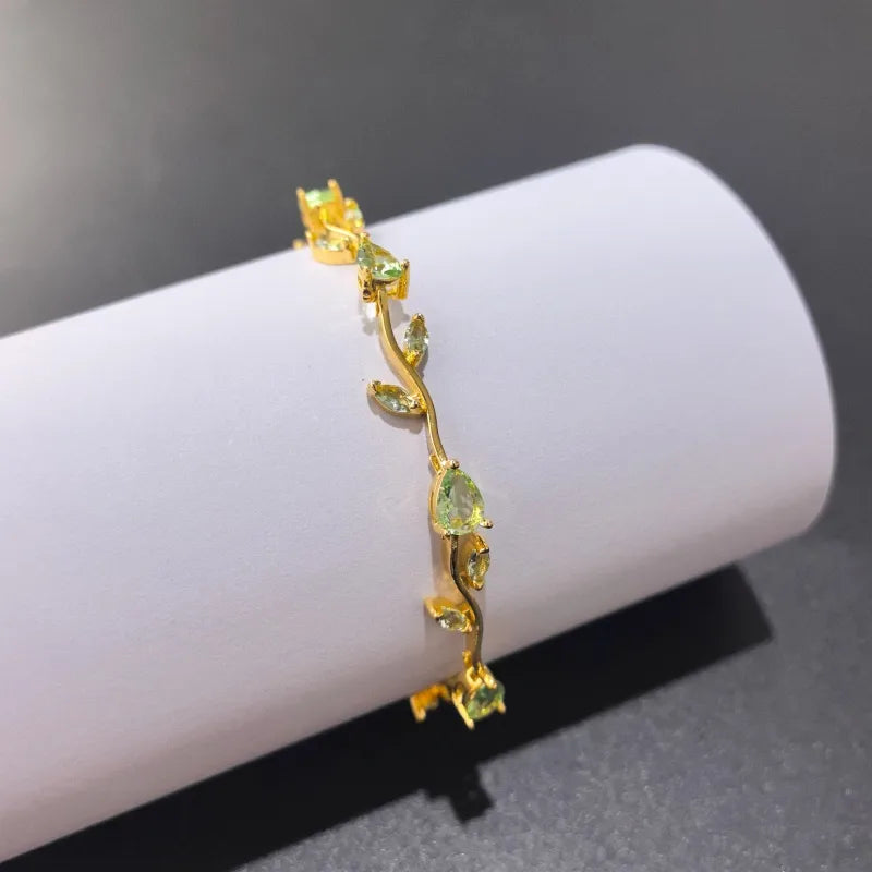 Pulsera de acero 304 con baño de oro 18K y diseño de hojas para mujer - imagen 10