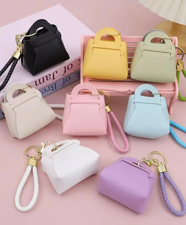 Monedero estilo macaron para monedas y audífonos, diseño kawaii