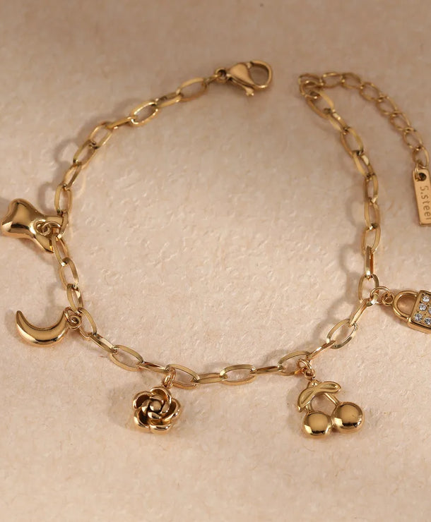 Pulsera de flores de cereza con baño de oro y circonias en acero 304