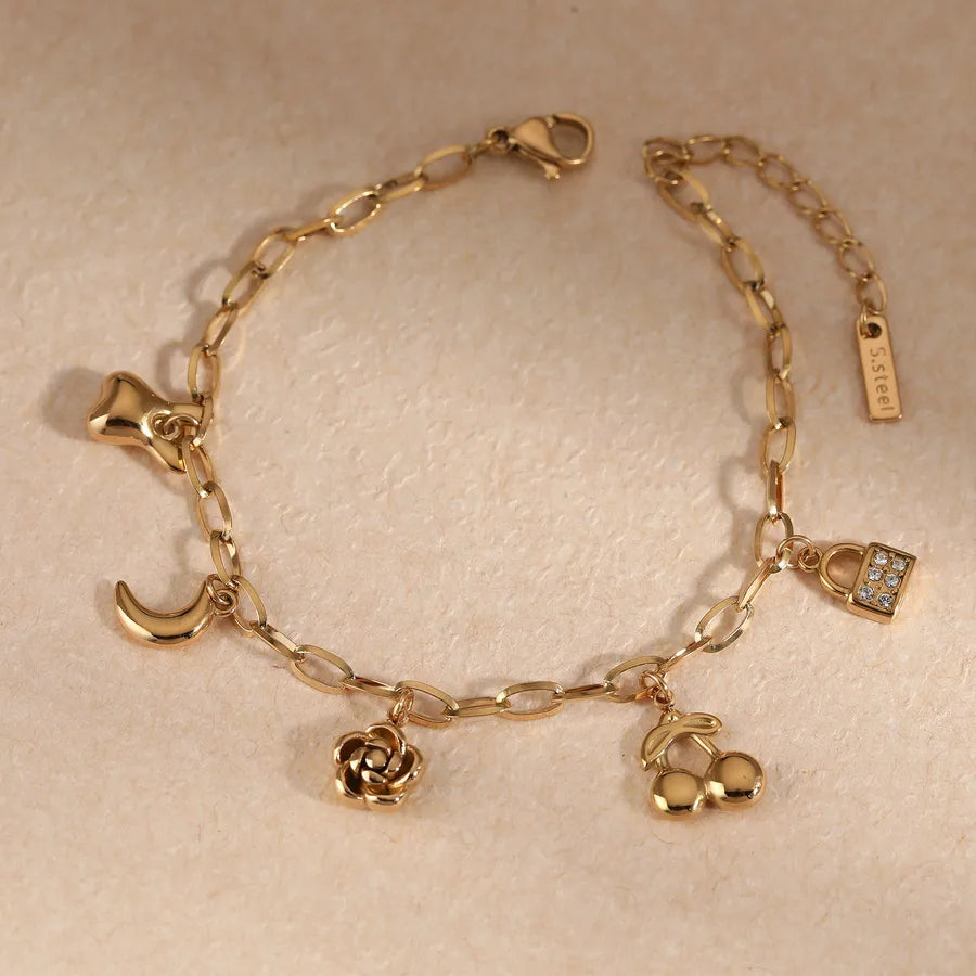 Pulsera de flores de cereza con baño de oro y circonias en acero 304