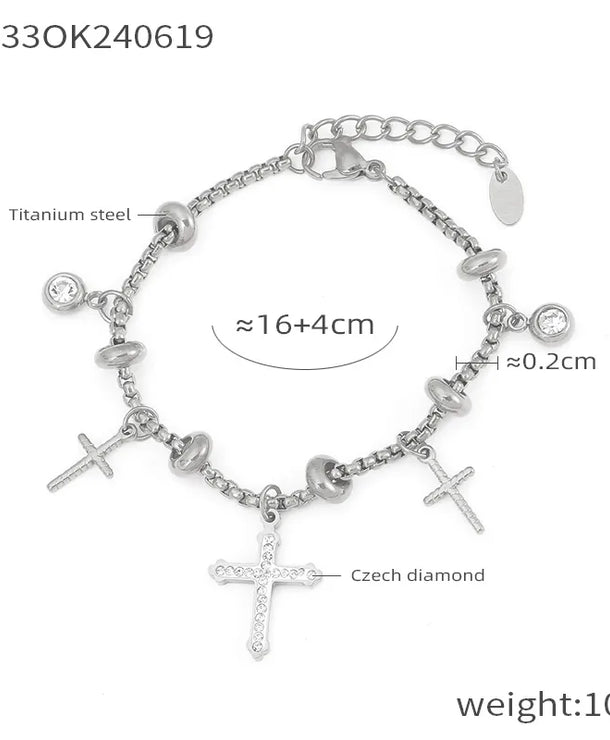 Pulsera de acero 304 con baño de oro 18K y dijes de cruz, estrella y corazón - imagen 10